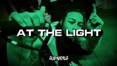 AT THE LIGHT