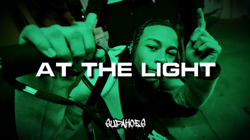 AT THE LIGHT