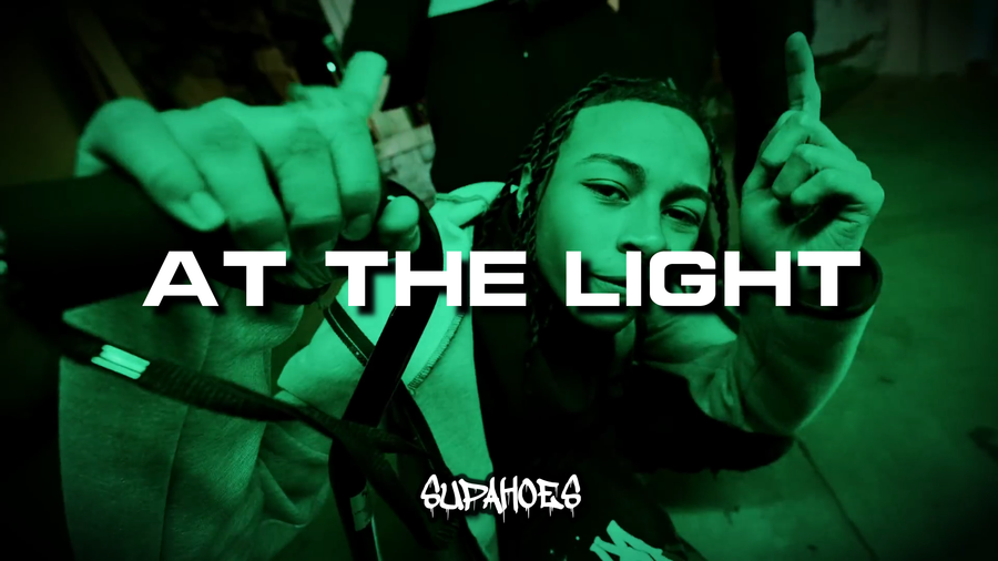 AT THE LIGHT